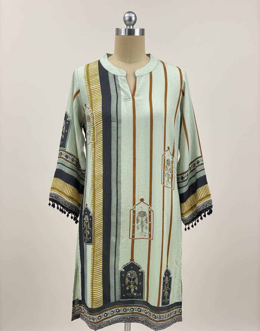 Decorative dress with intricate patterns on a mannequin against a white background