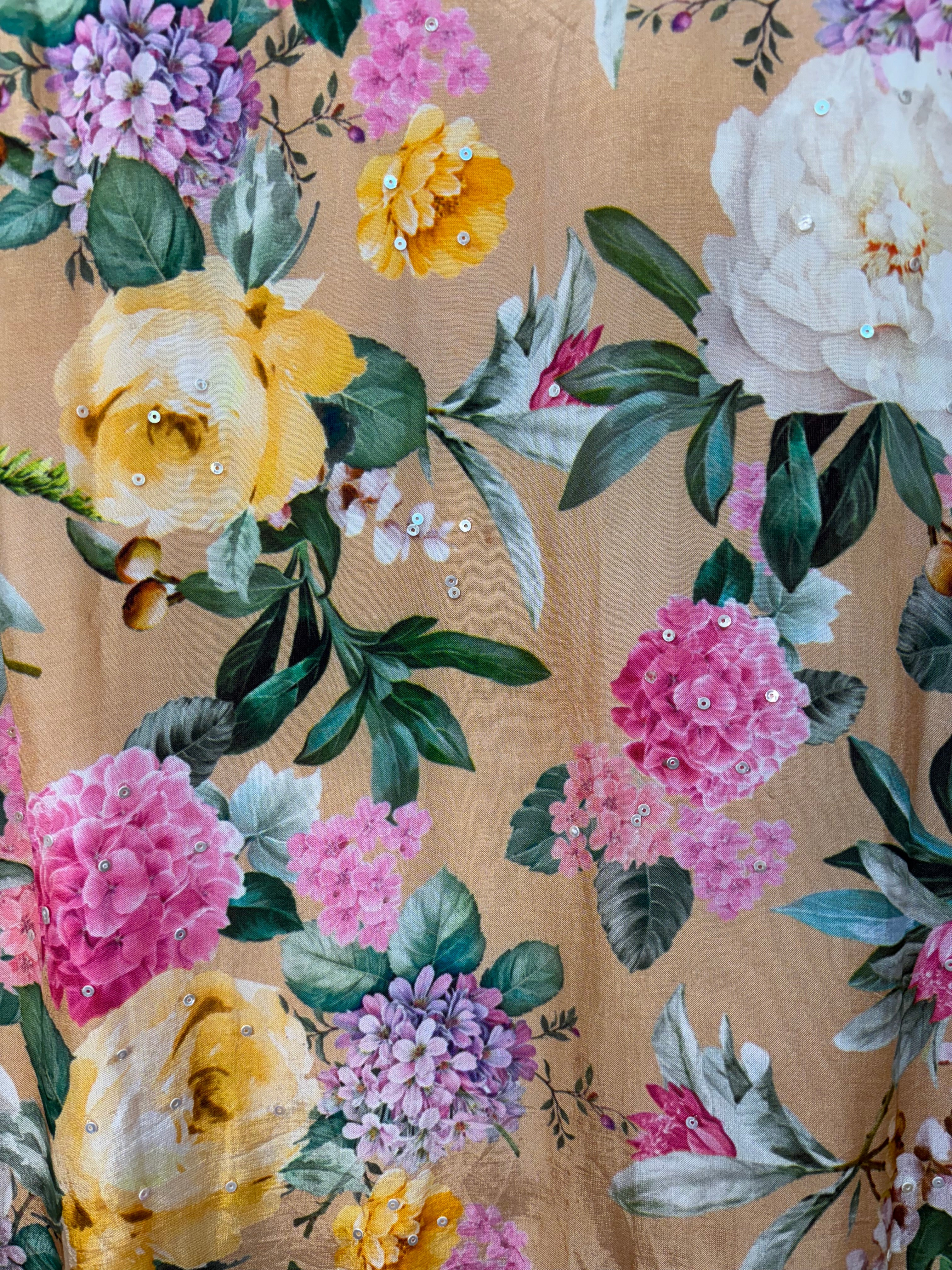 Floral pattern with pink, yellow, and white flowers on a beige background